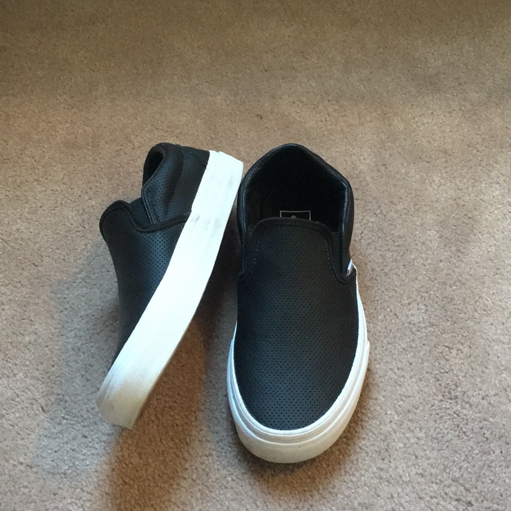 Black van slip on sneakers